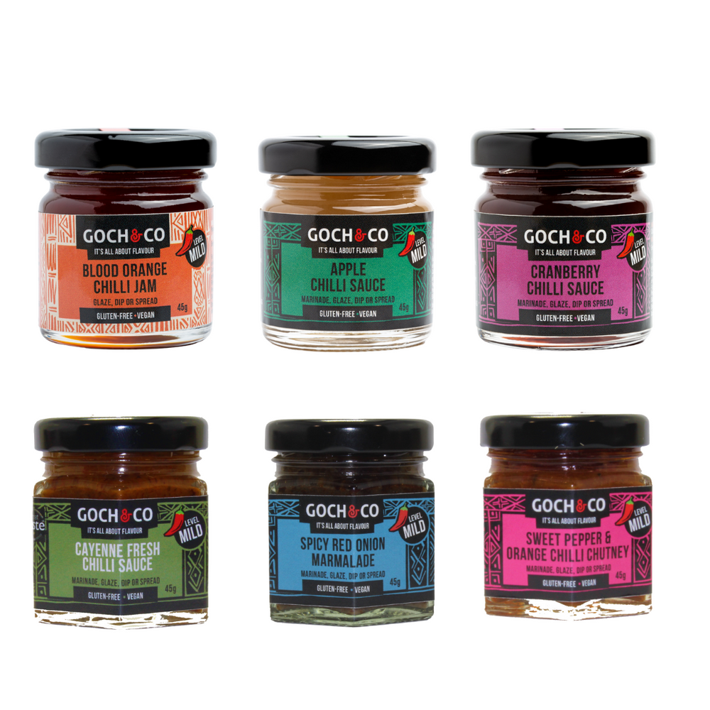 
                  
                    A collection of six jars of Goch & Co's award-winning chilli sauces, jams, and chutney, arranged in a grid layout against a white background.
                  
                
